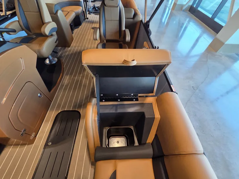 Slide: The Image of Interior of 2026 Bentley Pontoons Legacy 243 Navigator with storage compartment. - 10