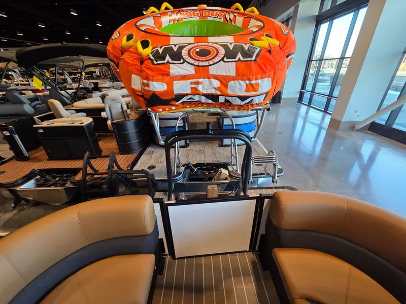 Slide: The Image of Bentley Pontoons Legacy 243 Navigator 2026 with inflatable watercraft. - 27