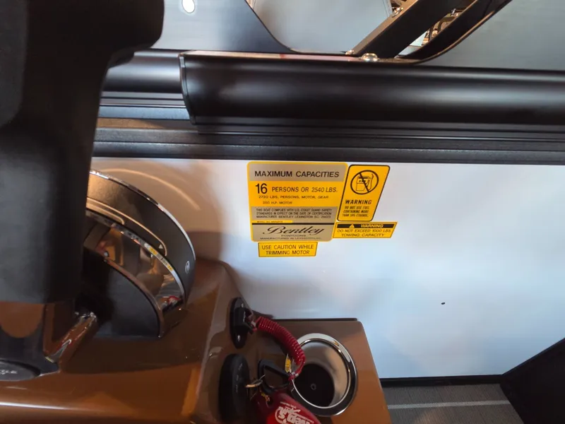 Slide: The Image of Control console of Bentley Pontoons Legacy 243 Navigator 2026. - 30