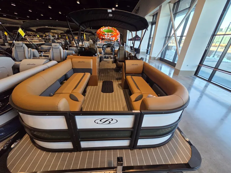 Slide: The Image of 2026 Bentley Pontoons Legacy 243 Navigator in showroom. - 4
