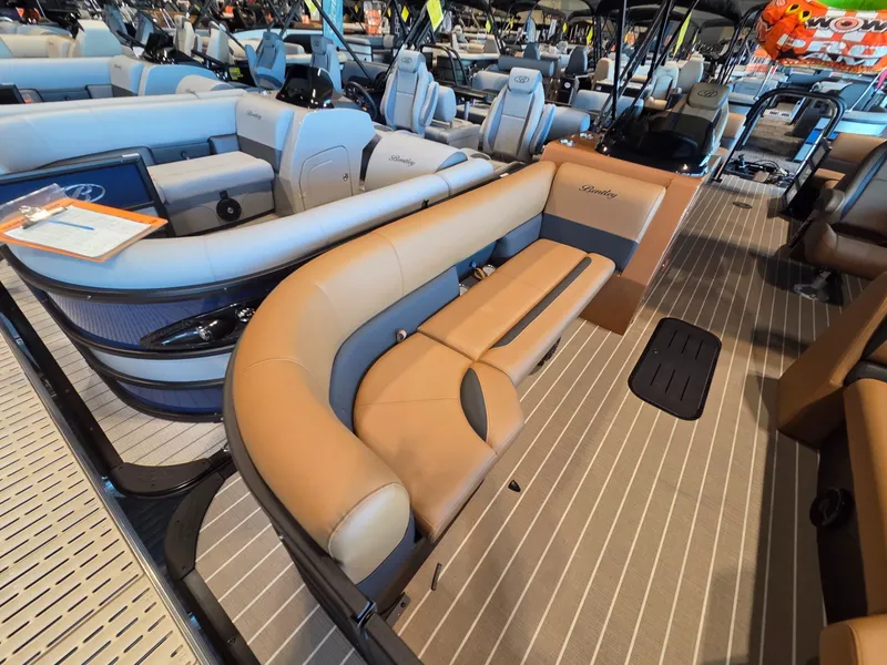Slide: The Image of 2026 Bentley Pontoons Legacy 243 Navigator interior view, luxurious seating. - 5