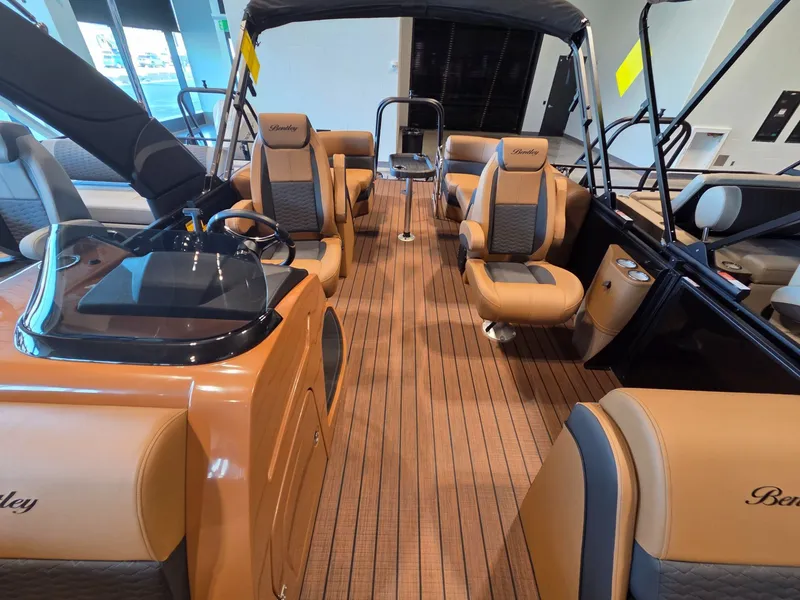 Slide: The Image of Interior of 2026 Bentley Pontoons Elite 253 Admiral with luxurious seating. - 12