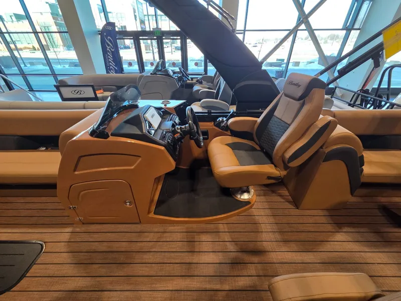 Slide: The Image of Interior of 2026 Bentley Pontoons Elite 253 Admiral with luxurious cockpit. - 15