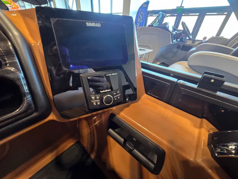 Slide: The Image of Interior of 2026 Bentley Pontoons Elite 253 Admiral with Simrad display. - 17