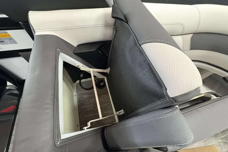 Slide: The Image of 2026 Viaggio D24U boat seat with open storage compartment, featuring gray and white upholstery. - 11