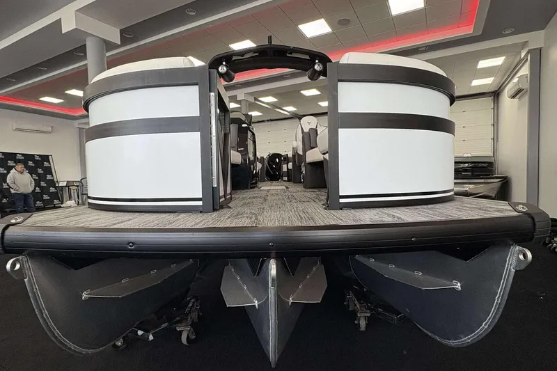 Slide: The Image of 2026 Viaggio D24U pontoon boat displayed in a showroom with modern interior design. - 4
