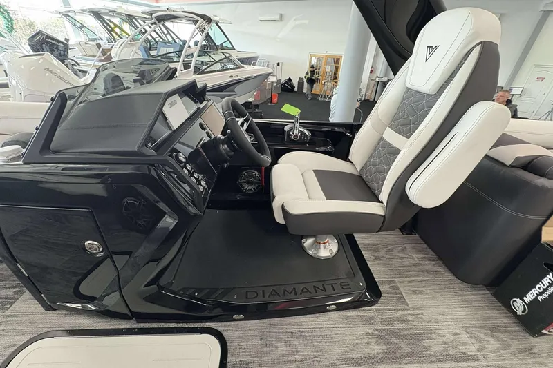 Slide: The Image of Luxurious Viaggio D24U 2026 boat interior with sleek black dashboard and plush seating. - 9