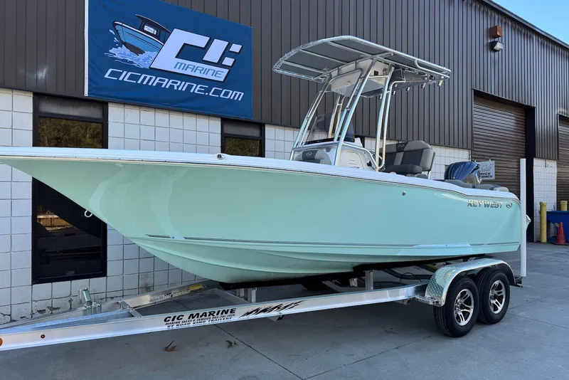 The Image of 2026 Key West 203 FS boat on trailer outside CIC Marine building. - 0
