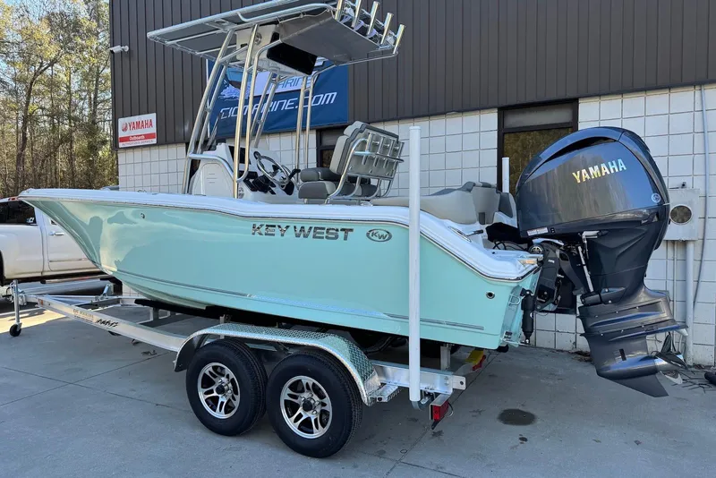 Slide: The Image of 2026 Key West 203 FS boat on trailer with Yamaha outboard motor. - 2