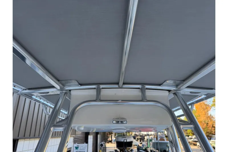 Slide: The Image of 2026 Key West 189 FS boat T-top frame, showcasing sturdy metal construction. - 22