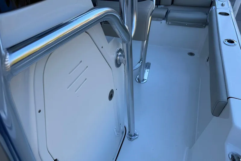 Slide: The Image of 2026 Key West 189 FS boat interior with seating and stainless steel features. - 23