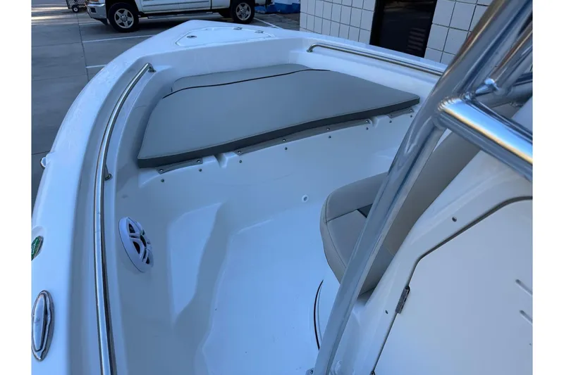 Slide: The Image of 2026 Key West 189 FS boat interior with seating and speaker, showcasing modern design. - 6