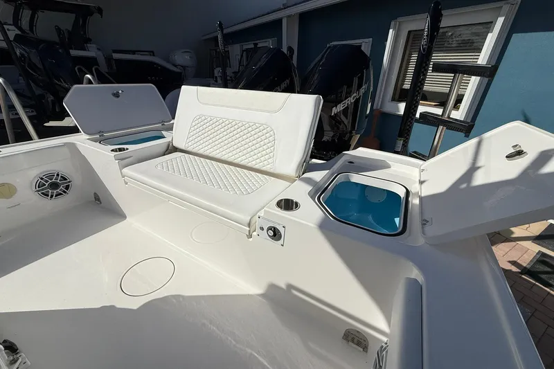 Slide: The Image of 2023 Caymas 28 HB Twin boat interior with seating and storage compartments. - 18