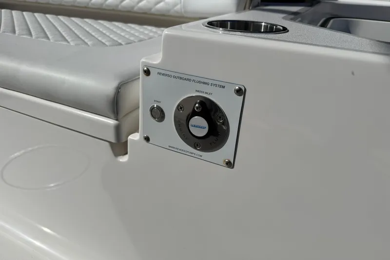 Slide: The Image of 2023 Caymas 28 HB Twin boat with Reverso outboard flushing system detail. - 19