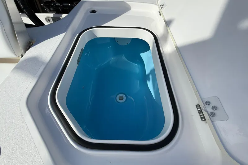 Slide: The Image of 2023 Caymas 28 HB Twin boat livewell with blue interior. - 20