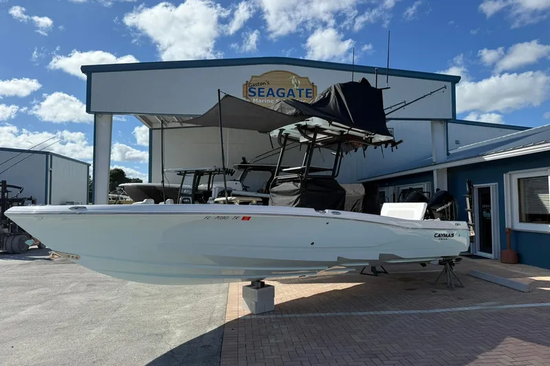 Slide: The Image of 2023 Caymas 28 HB Twin boat displayed at Seagate Marine dealership. - 3