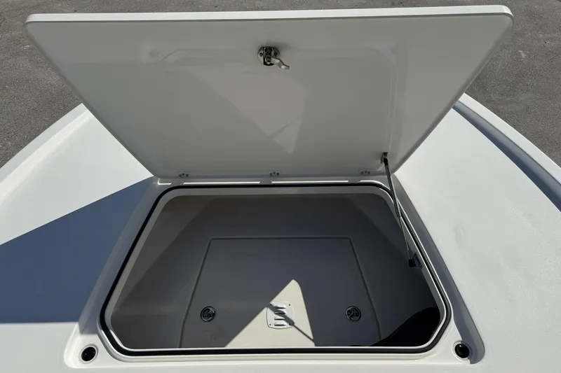 Slide: The Image of Open storage compartment on 2023 Caymas 28 HB Twin boat. - 40