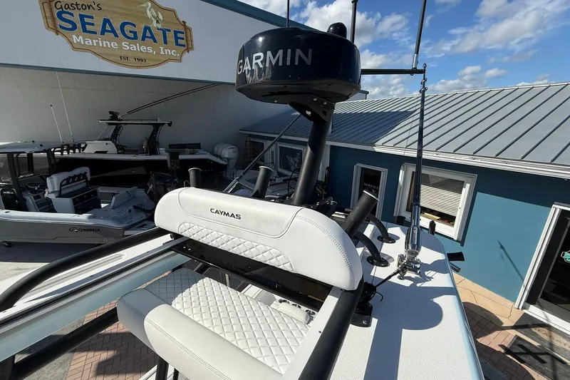 Slide: The Image of 2023 Caymas 28 HB Twin boat at Seagate Marine Sales, featuring Garmin equipment. - 47