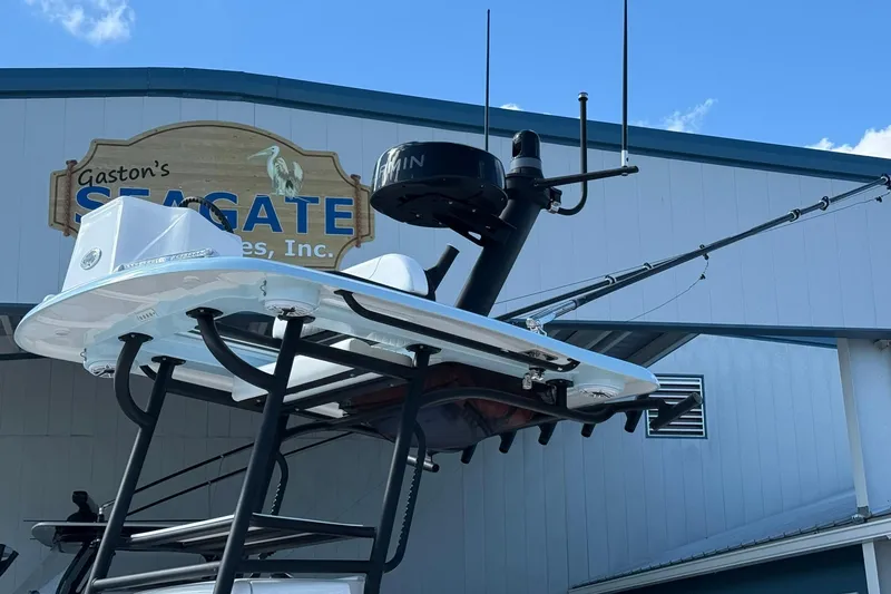 Slide: The Image of 2023 Caymas 28 HB Twin boat with radar, displayed at Gaston's Seagate Marine. - 5