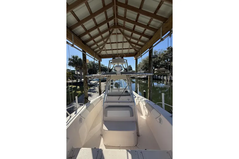 Slide: The Image of 2005 Grady-White Bimini 306 boat deck with anchor chain and winch. - 25
