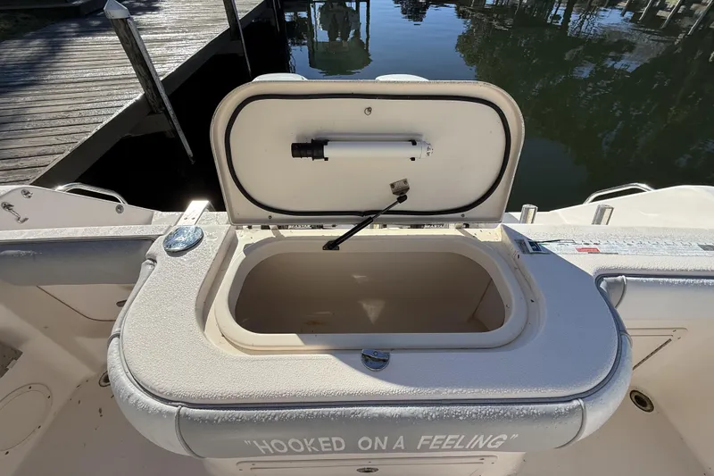 Slide: The Image of 2005 Grady-White Bimini 306 boat interior with "Hooked on a Feeling" text. - 27