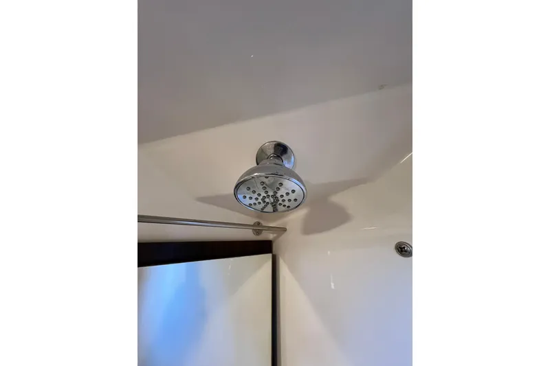 Slide: The Image of Showerhead in 2018 Regal 28 Express boat bathroom interior. - 39