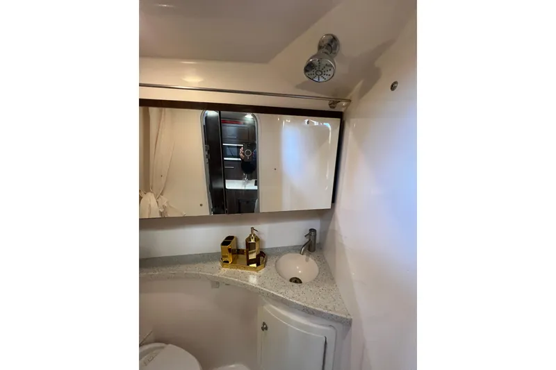Slide: The Image of 2018 Regal 28 Express bathroom with mirror, sink, and modern fixtures. - 44