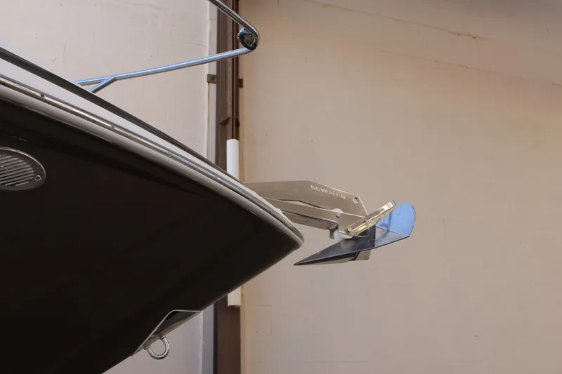 Slide: The Image of Bow of 2018 Regal 28 Express boat with anchor in storage. - 6