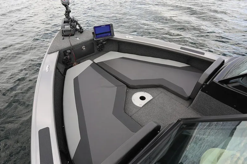 Slide: The Image of Manufacturer Provided Image: 2025 Lund 1975 Pro-V boat interior with advanced navigation system on calm water. - 18