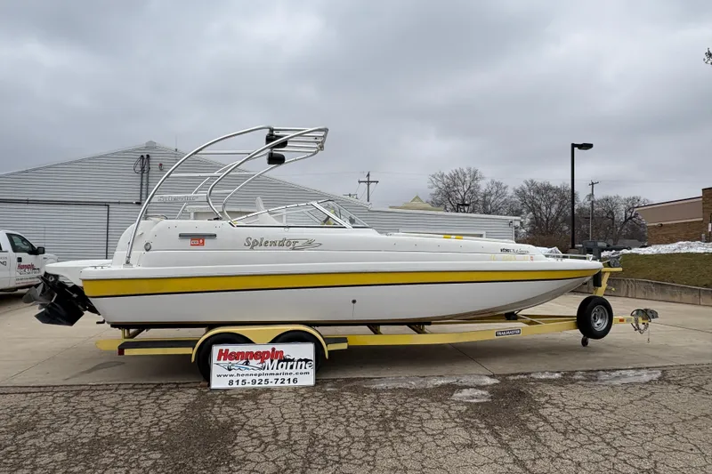 The Image of 2003 Splendor 240 Platinum boat on trailer at Hennepin Marine dealership. - 1