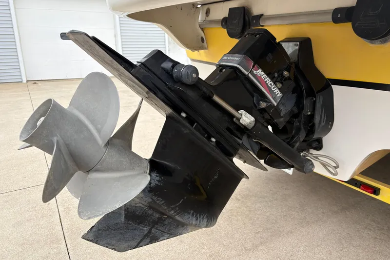 Slide: The Image of 2003 Splendor 240 Platinum boat with Mercury outboard motor and propeller. - 36