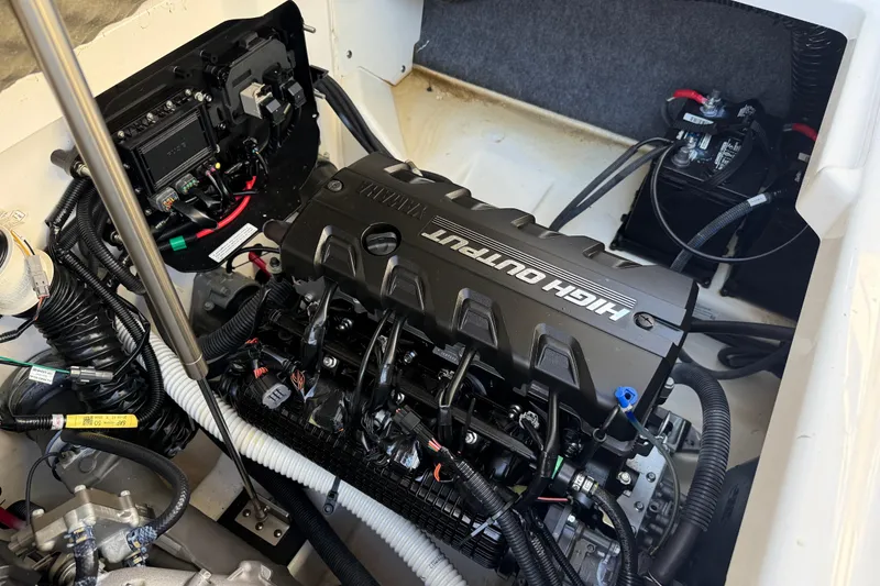Slide: The Image of 2021 Yamaha Boats 252S engine compartment showcasing high output engine components. - 19