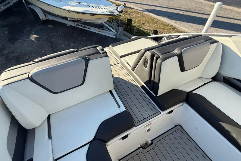 Slide: The Image of 2021 Yamaha Boats 252S interior with sleek seating and modern design. - 21