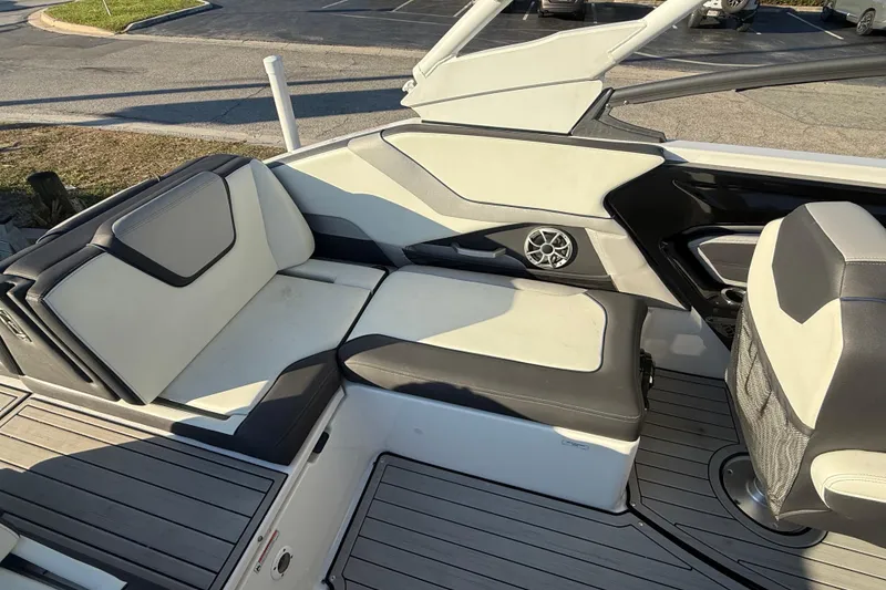 Slide: The Image of 2021 Yamaha Boats 252S interior with sleek seating and modern design. - 22