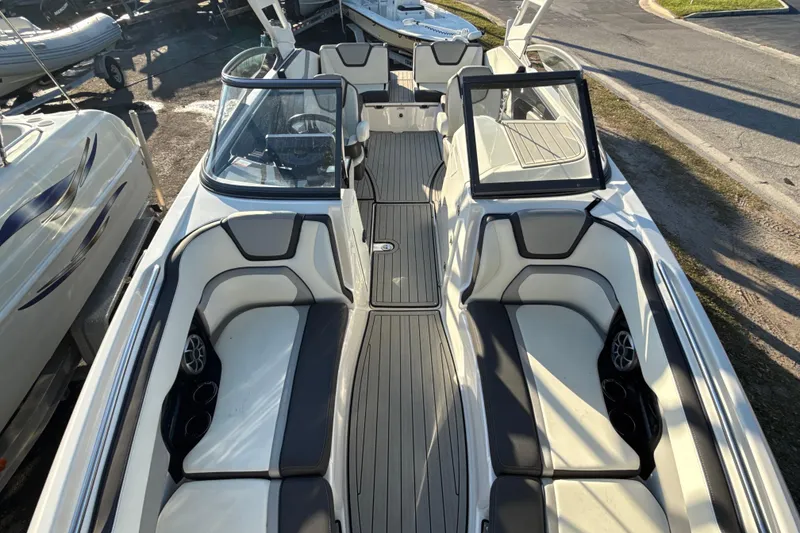 Slide: The Image of 2021 Yamaha Boats 252S interior with sleek seating and modern design. - 41