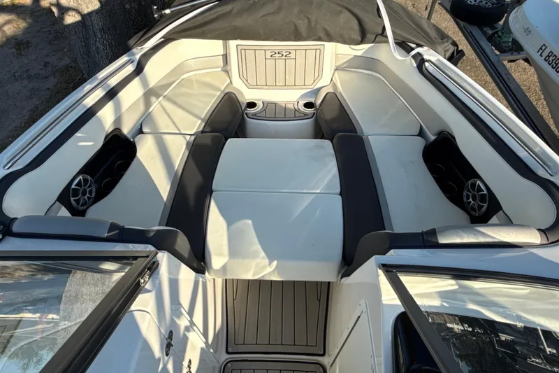 Slide: The Image of 2021 Yamaha Boats 252S interior with spacious seating and modern design. - 47