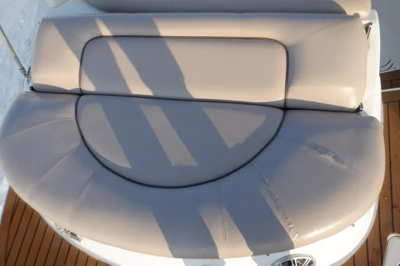Slide: The Image of 2013 Hurricane SunDeck 2400 IO boat seating, beige upholstery, top view. - 22
