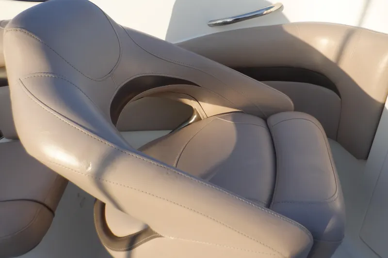 Slide: The Image of 2013 Hurricane SunDeck 2400 IO boat seat, beige leather upholstery. - 32