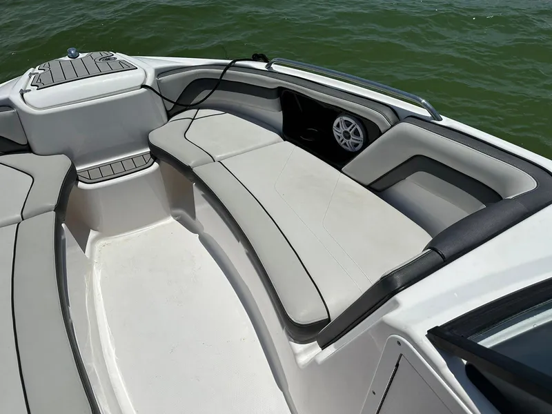 Slide: The Image of Yamaha AR240 2020 boat interior with cushioned seating on water. - 12