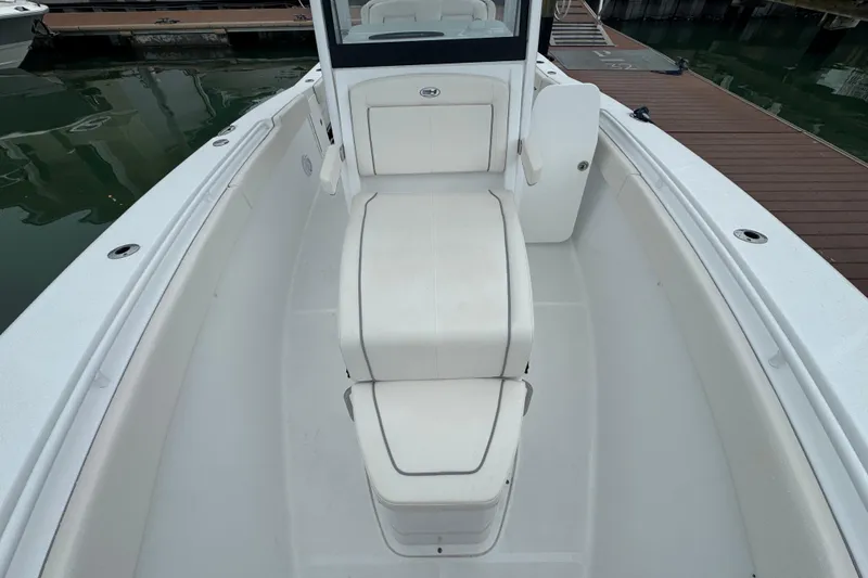 Slide: The Image of 2024 Sea Hunt Gamefish 27 Coffin Box boat interior, featuring spacious seating and sleek design. - 22