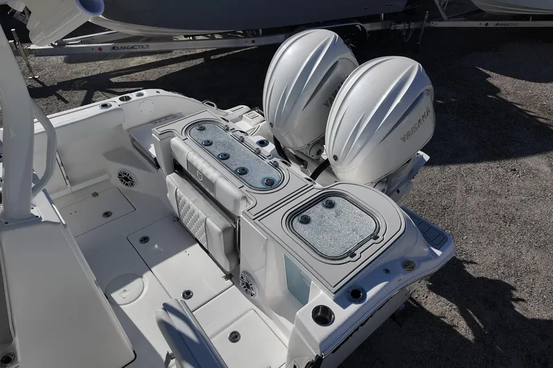 Slide: The Image of 2026 Sea Fox 288 Commander boat with dual Yamaha outboard engines, rear deck view. - 11