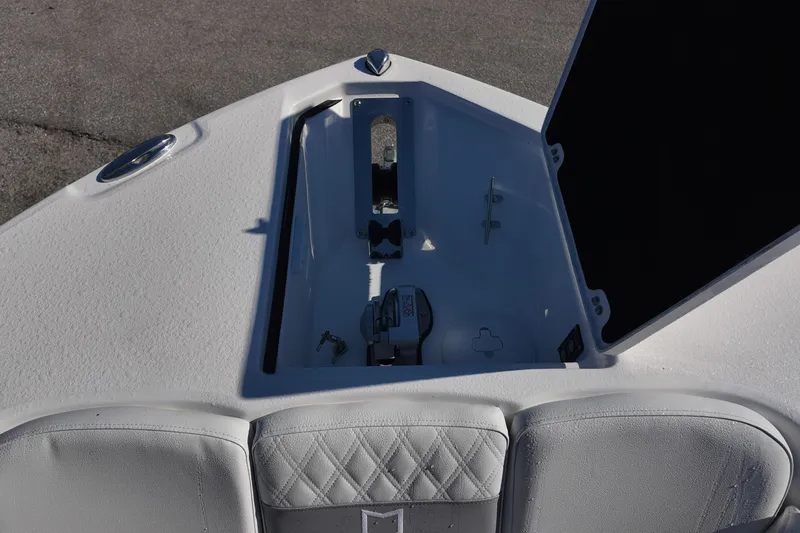Slide: The Image of 2026 Sea Fox 288 Commander boat anchor compartment with cushioned seating. - 17