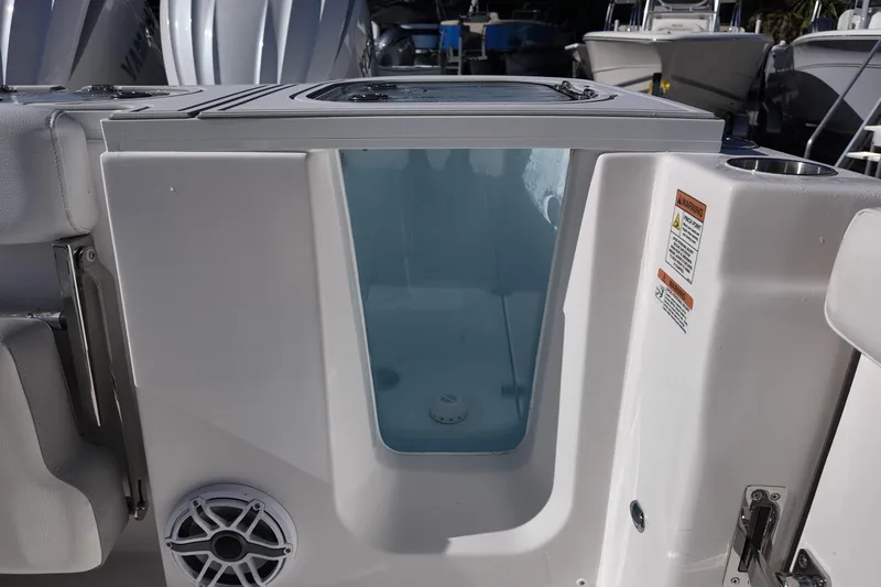 Slide: The Image of 2026 Sea Fox 288 Commander boat interior with livewell and speaker. - 20