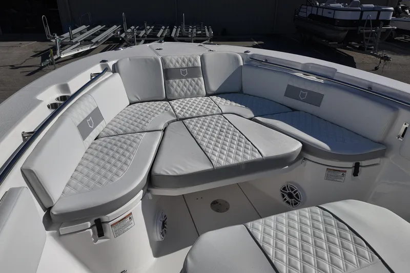 Slide: The Image of Luxurious seating area on 2026 Sea Fox 288 Commander boat, featuring quilted upholstery. - 21