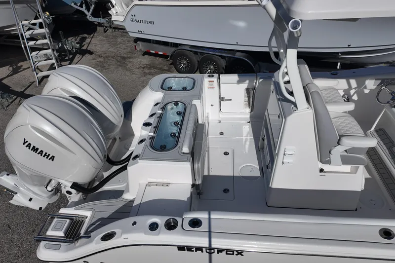 Slide: The Image of 2026 Sea Fox 288 Commander boat with dual Yamaha engines and spacious seating area. - 23