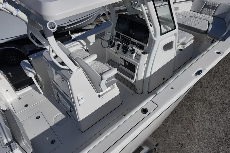 Slide: The Image of 2026 Sea Fox 288 Commander boat interior with modern helm and seating. - 7