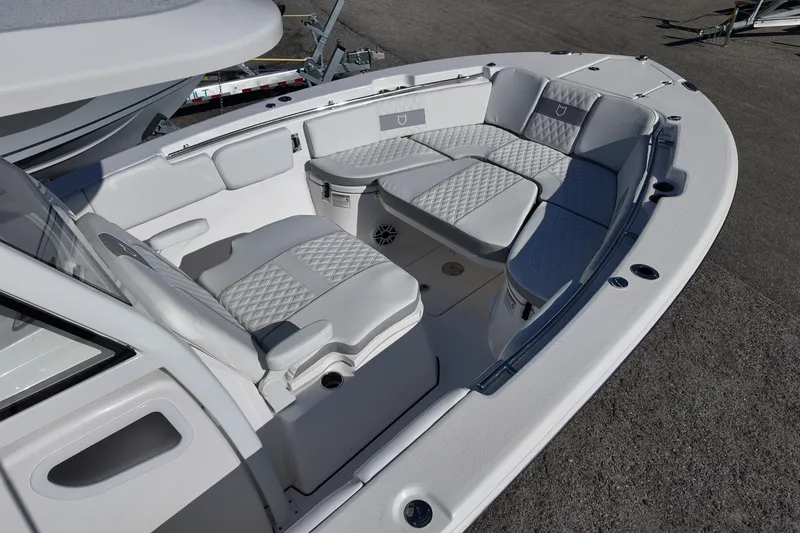 Slide: The Image of 2026 Sea Fox 288 Commander boat interior with cushioned seating and modern design. - 8