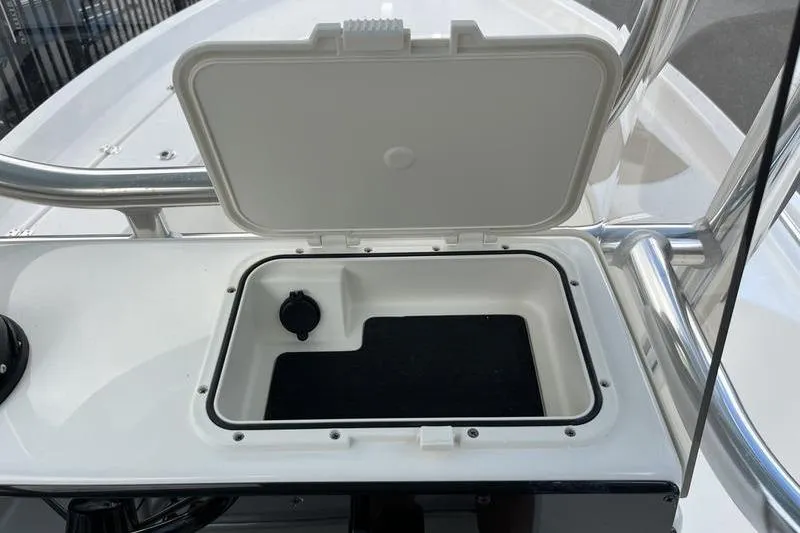 Slide: The Image of Open storage compartment on 2025 Bulls Bay 2400 boat, featuring sleek design and functionality. - 12