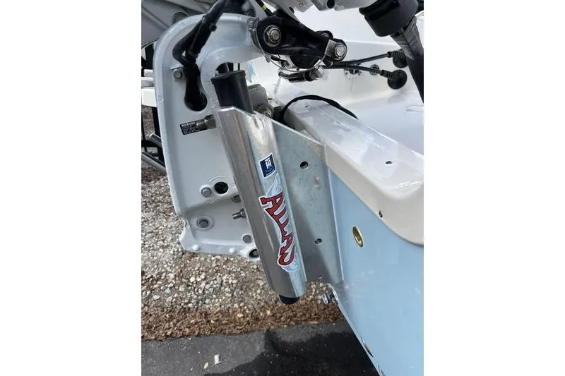 Slide: The Image of 2025 Bulls Bay 2400 boat with trim tab detail and hydraulic components. - 17