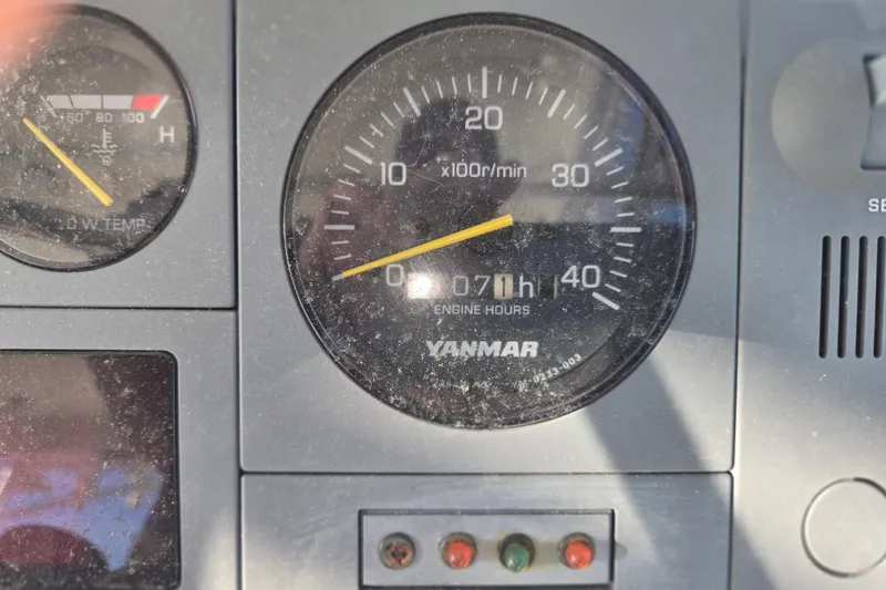 Slide: The Image of Close-up of Yanmar engine hour meter on 2001 Henriques 35 Flybridge boat dashboard. - 10